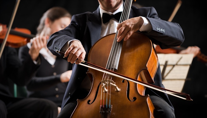 A man playing Violin to create a soundtrack