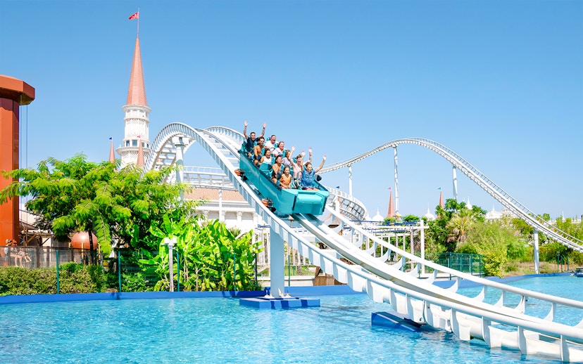 Roller coaster descending into water at Land of Legends Themepark, Turkey.