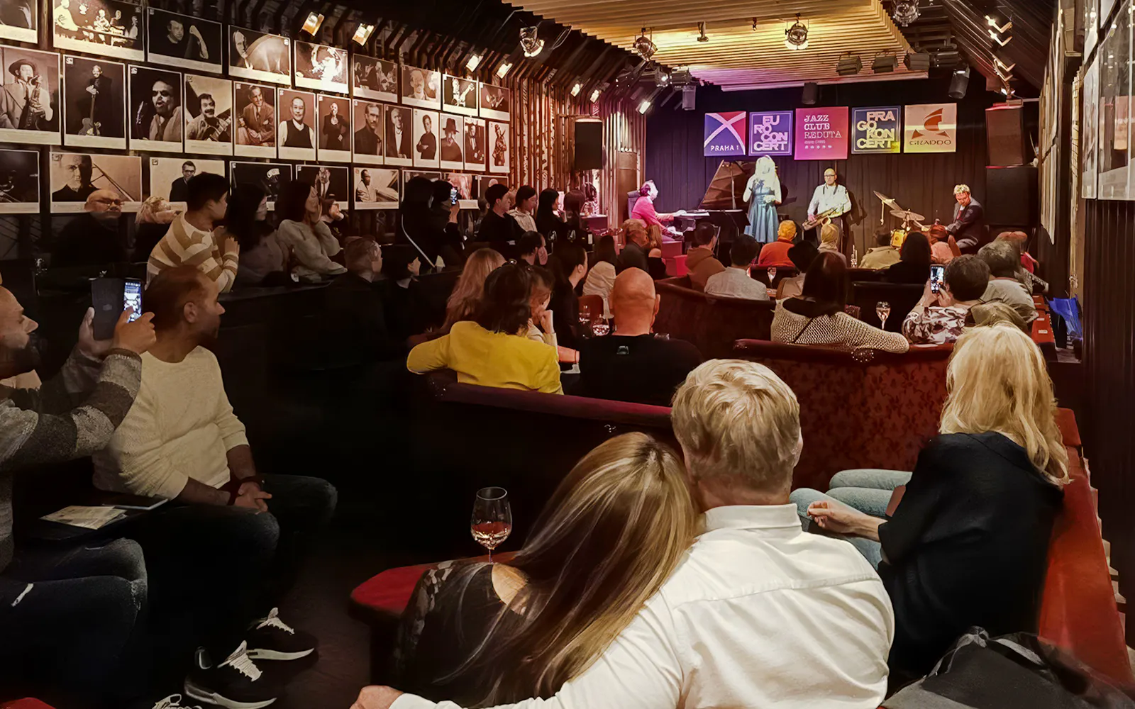 Audience enjoying live music at Reduta Jazz Club concert in Prague.