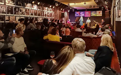Audience enjoying live music at Reduta Jazz Club concert in Prague.