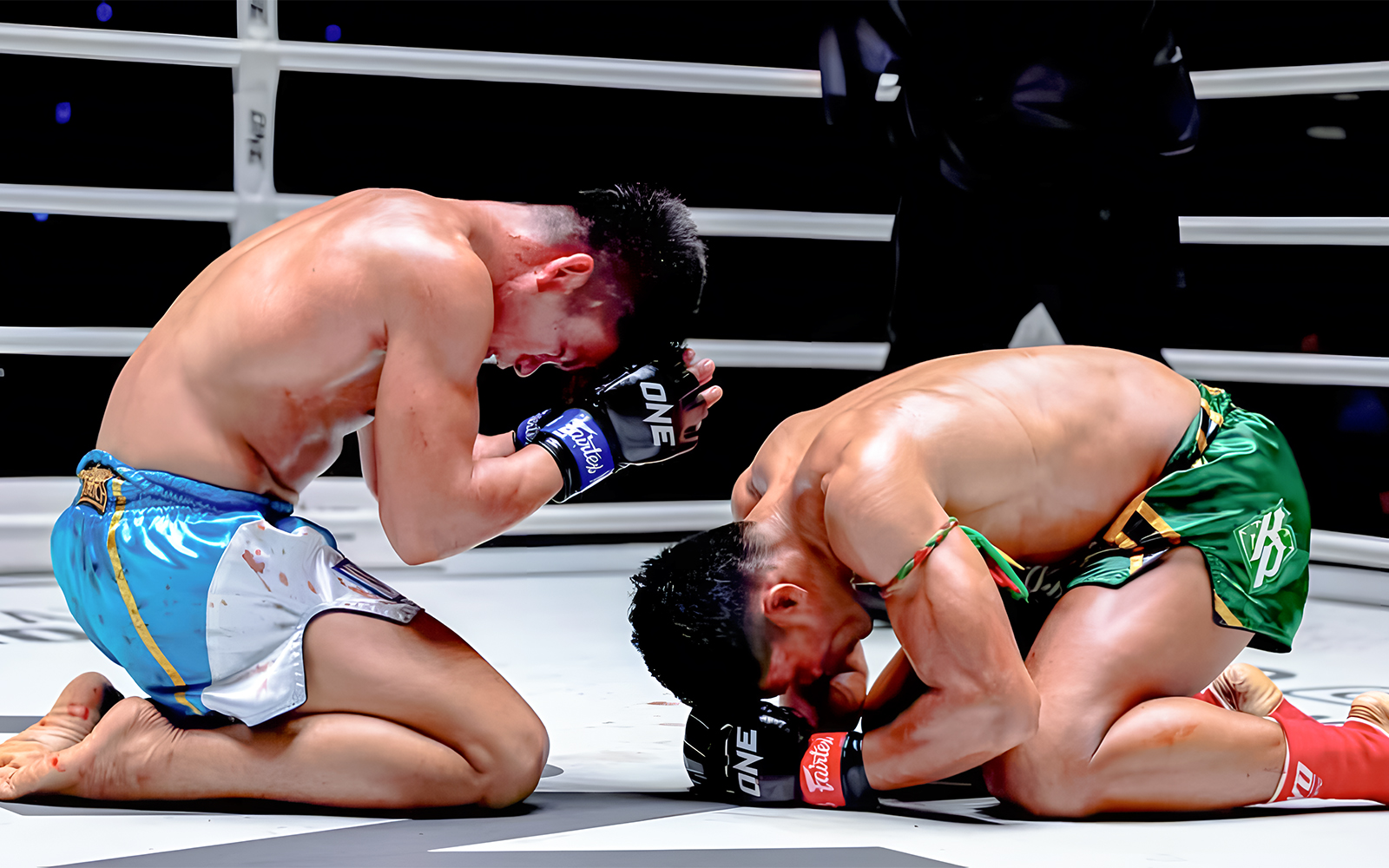 Muay Thai fighters performing Wai Kru dance at One Lumpinee Boxing Stadium.