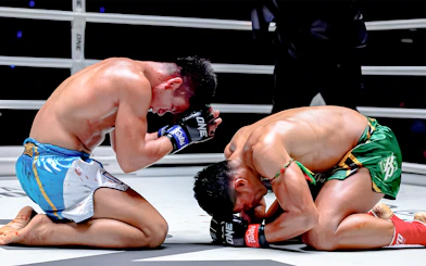 Muay Thai fighters performing Wai Kru dance at One Lumpinee Boxing Stadium.