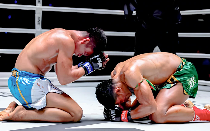 Muay Thai fighters performing Wai Kru dance at One Lumpinee Boxing Stadium.