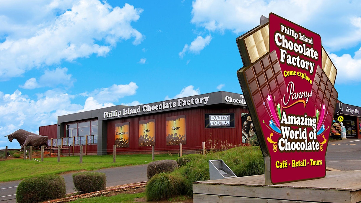 Phillip Island Chocolate Factory exterior with visitors exploring the entrance area.