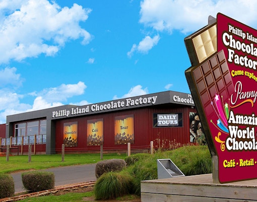 Phillip Island Chocolate Factory exterior with visitors exploring the entrance area.