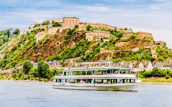 Gilles Boat cruising on the Rhine River with Ehrenbreitstein Fortress in the background.