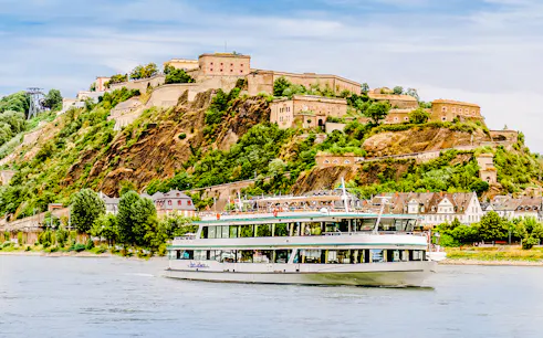 Gilles Boat cruising on the Rhine River with Ehrenbreitstein Fortress in the background.