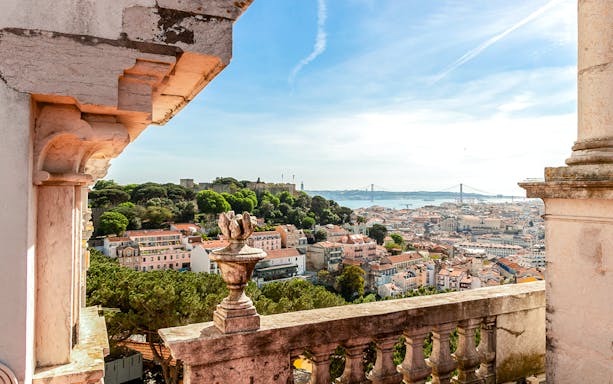 View from the Church of Graça terrace overlooking Lisbon and the 25 de Abril Bridge.
