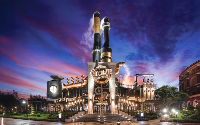 Chocolate Emporium exterior at Universal Studios Resort, Orlando, Florida at dusk.