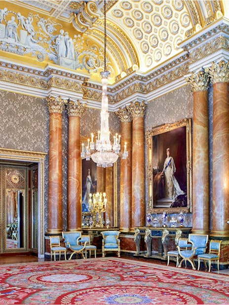 Buckingham Palace State Room with ornate chandeliers and regal decor.