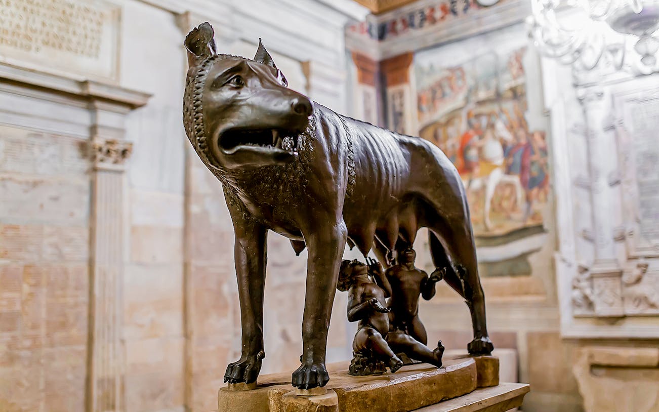 Capitoline She-Wolf statue with Romulus and Remus in Rome museum.
