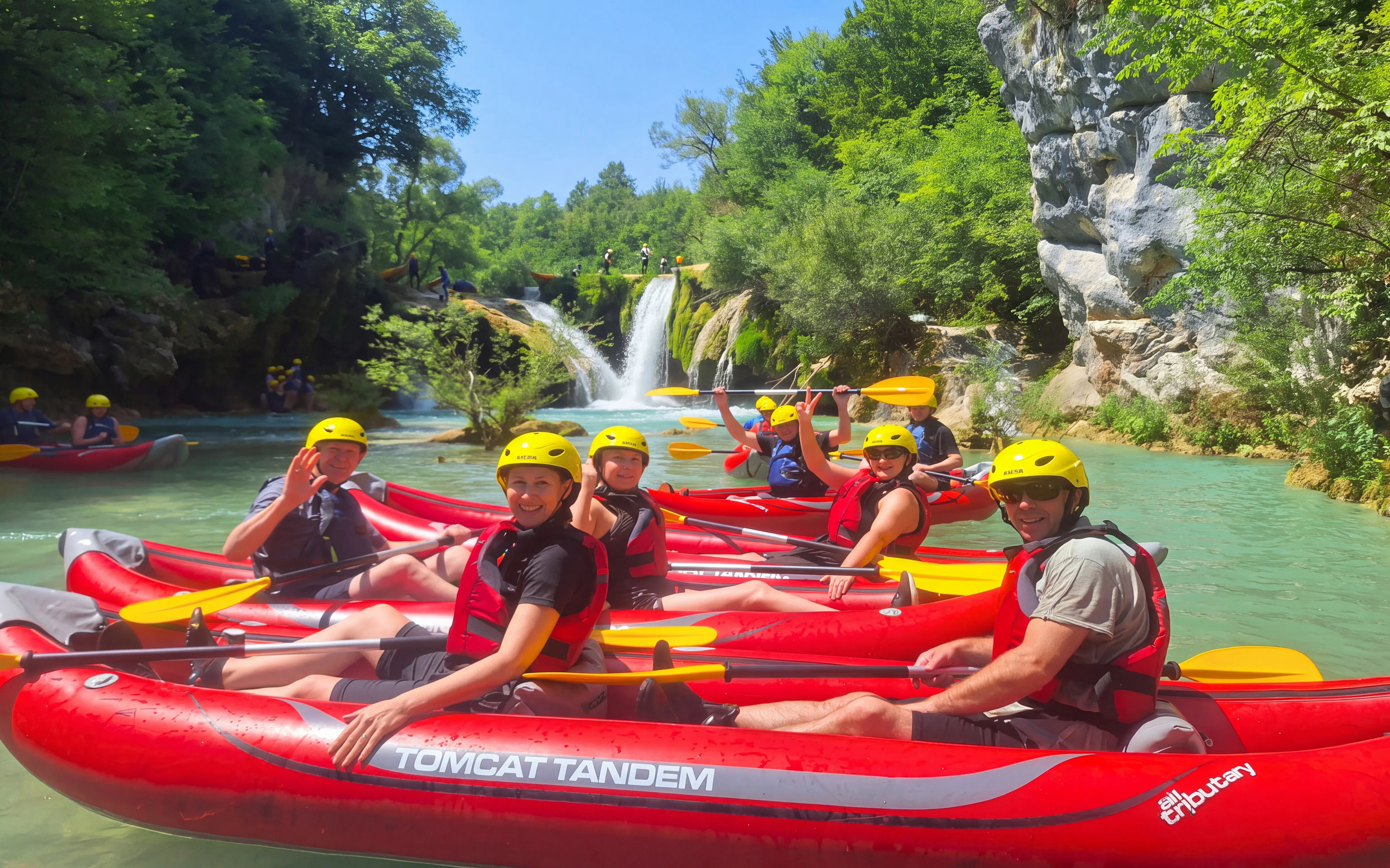 Tourists kayaking in Mrežnica Canyon with waterfalls in Split.