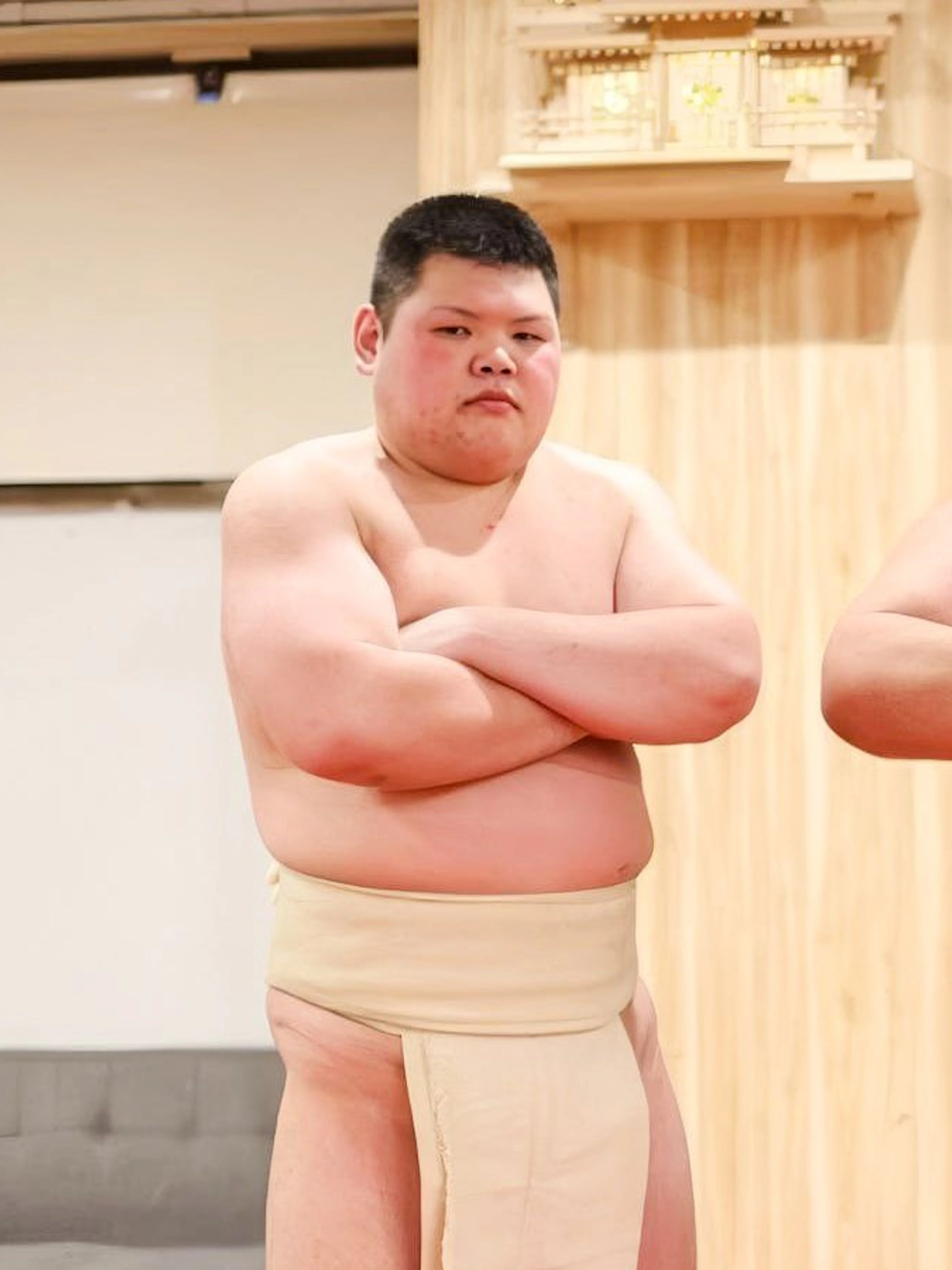 Sumo wrestlers posing at Shibuya Sumo Show in Tokyo.