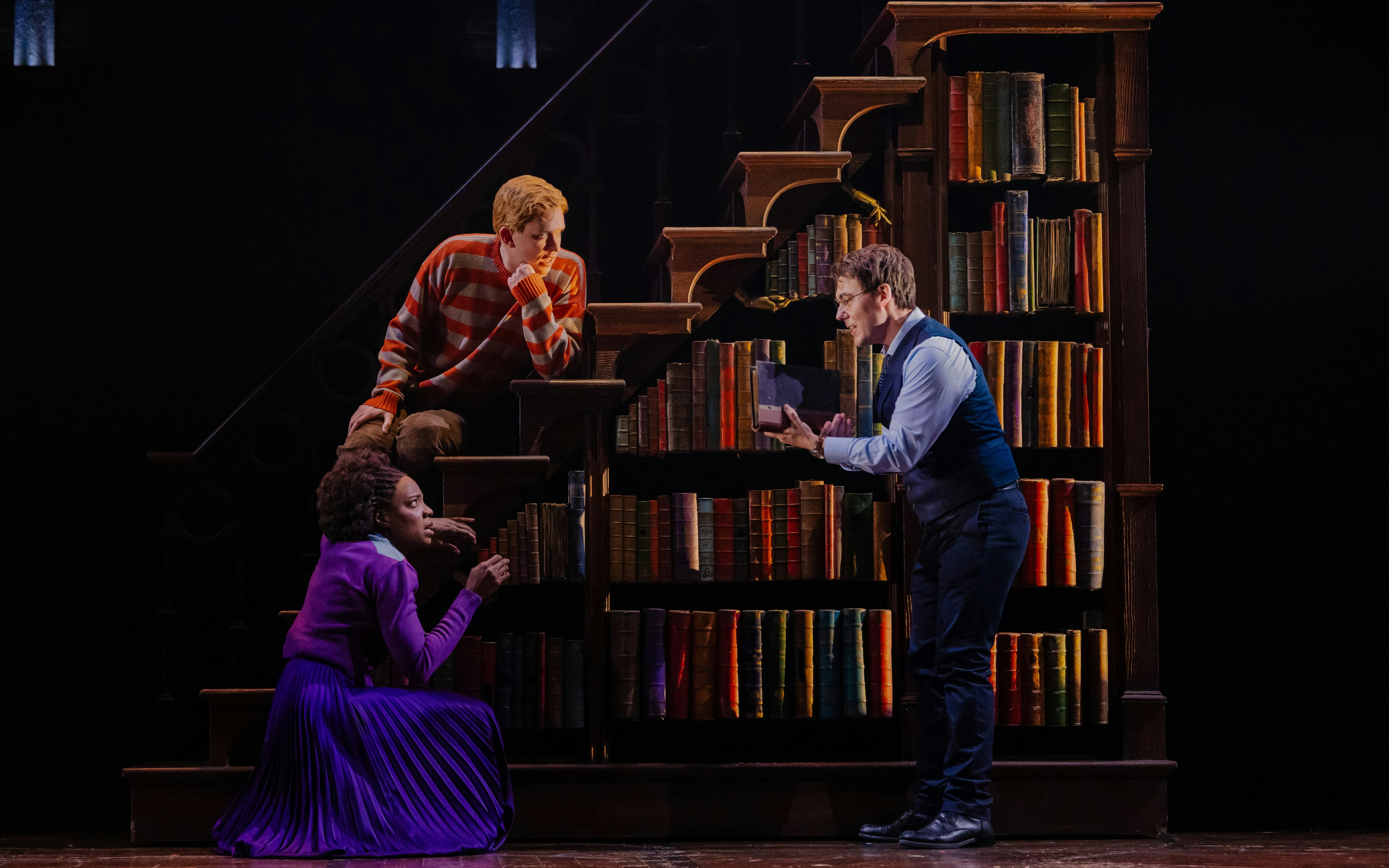 Actors performing a scene from Harry Potter and the Cursed Child on Broadway stage.