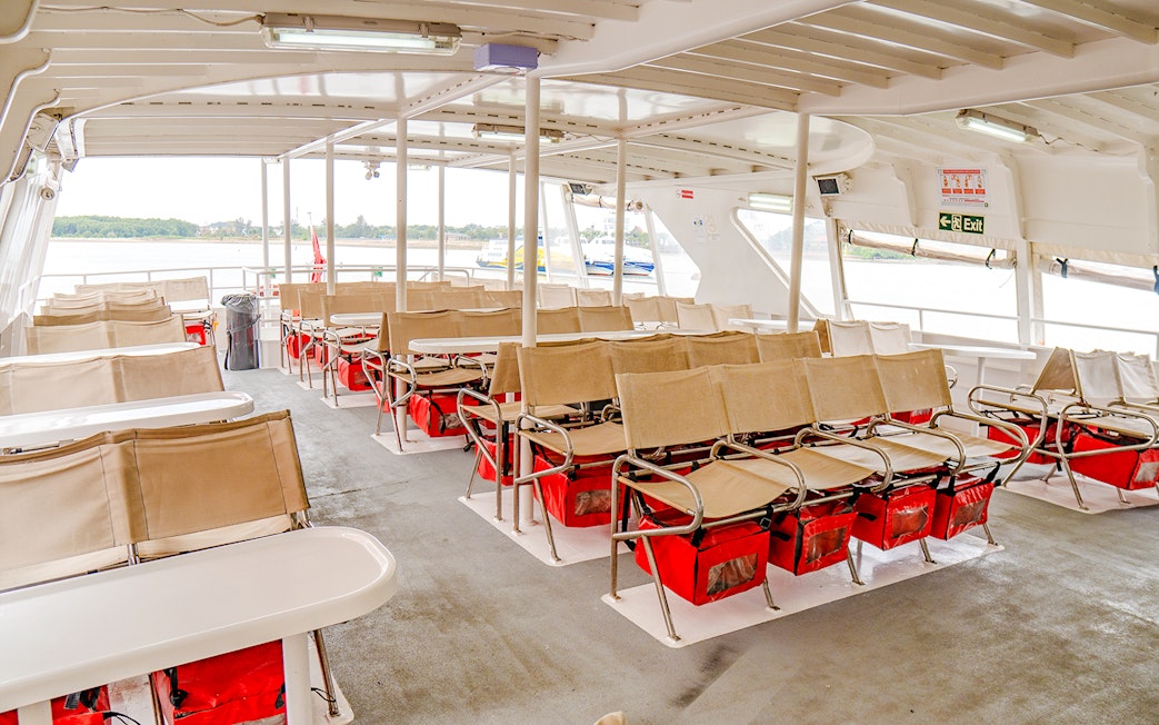 Ferry deck seating area on Singapore to Batam route.