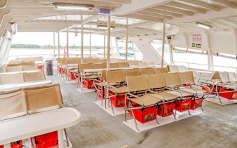 Ferry deck seating area on Singapore to Batam route.