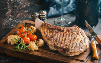 Grilled steak with tomatoes and cauliflower at a Brazilian steakhouse in Rio de Janeiro.