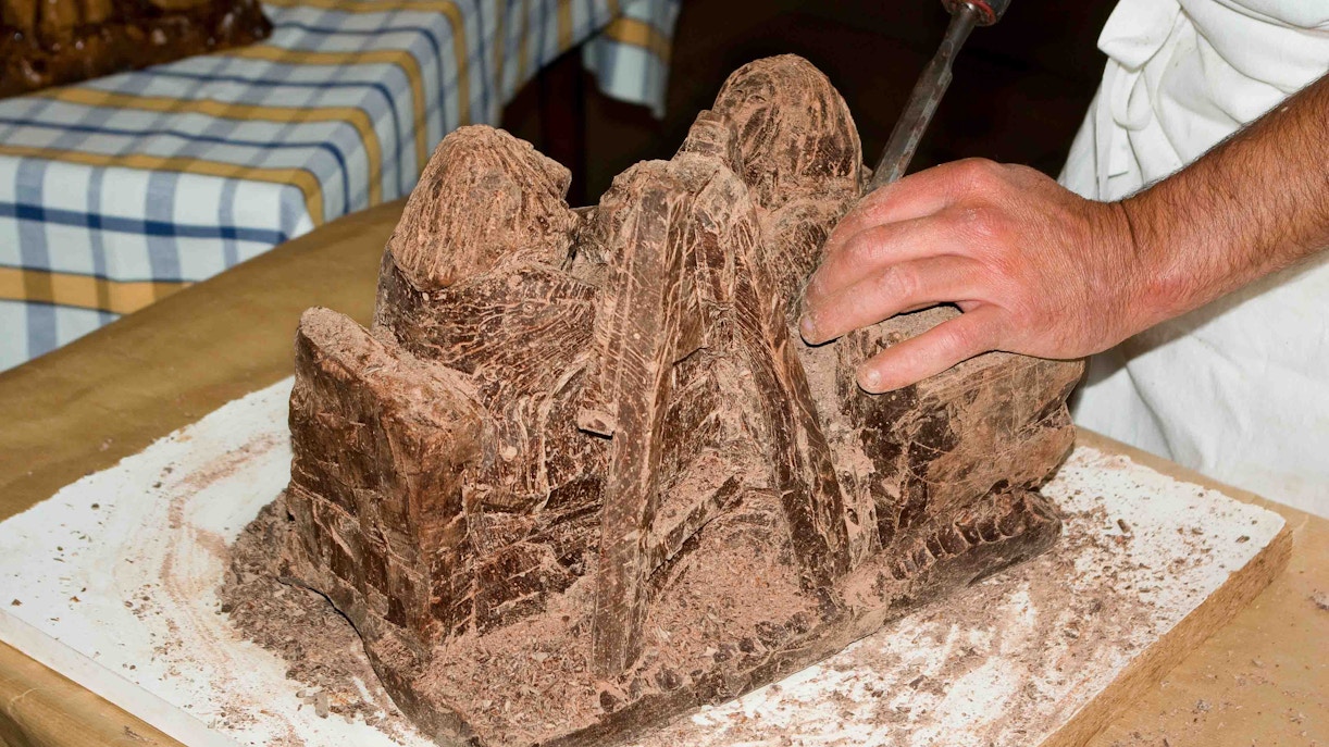 Chocolate sculpture being carved at the Chocolate Museum in Vienna.