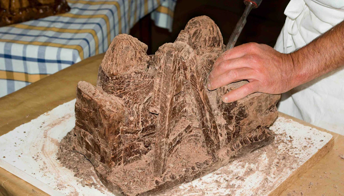 Chocolate sculpture being carved at the Chocolate Museum in Vienna.