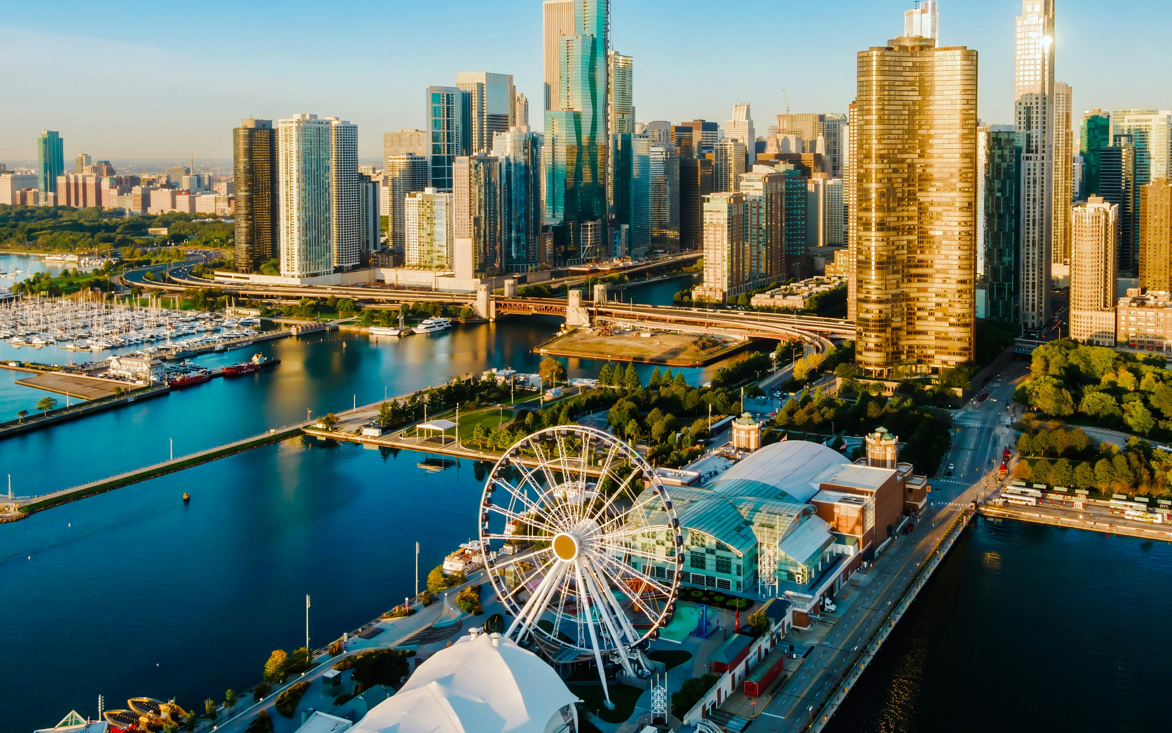 Aerial view of Navy Pier Ferris Wheel and Chicago skyline.