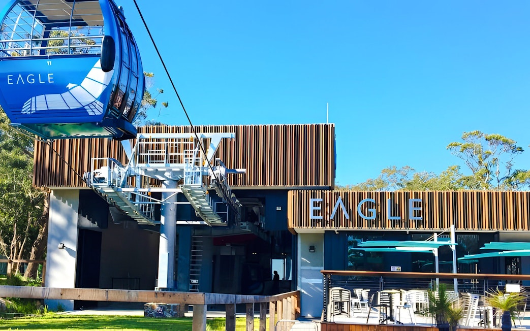 Arthurs Seat Eagle cable car station with blue gondola in Victoria, Australia.
