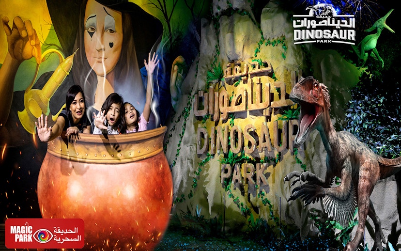 Visitors in a cauldron at Dubai Garden Glow's Dinosaur Park with dinosaur sculpture.