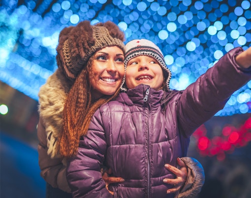 Kid with parent in Christmas