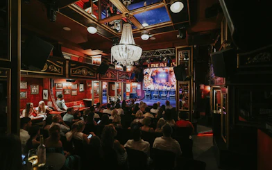 Audience seated at Teatro Flamenco Málaga Club awaiting a flamenco performance.