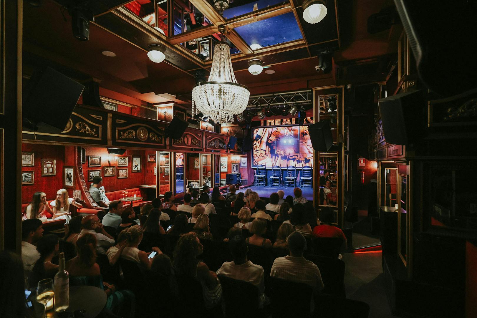 Audience seated at Teatro Flamenco Málaga Club awaiting a flamenco performance.