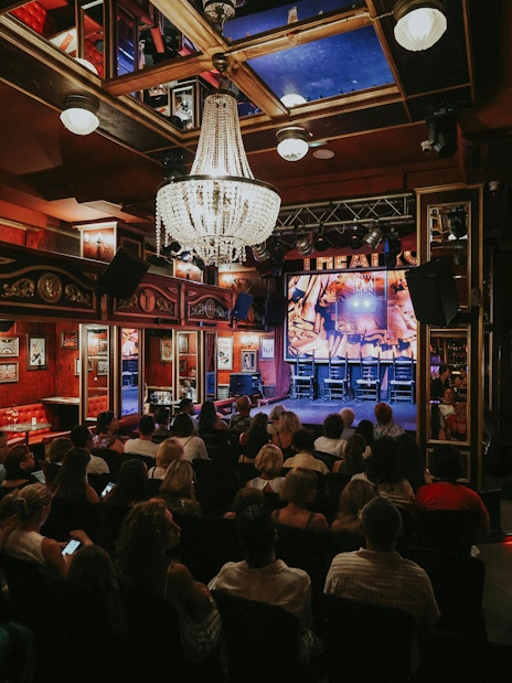 Audience seated at Teatro Flamenco Málaga Club awaiting a flamenco performance.