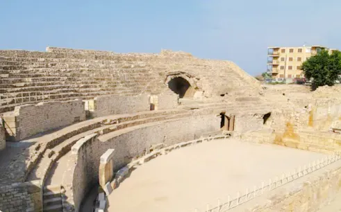 Roman amphitheater ruins in Tarragona, Spain, part of the ancient monuments audio tour.