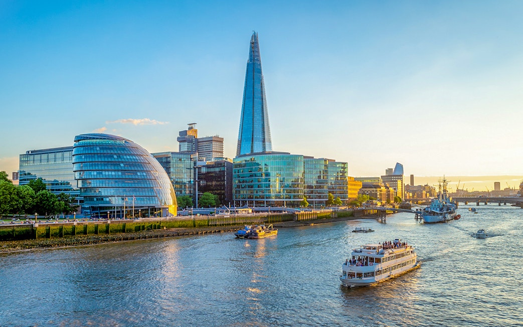 River Thames cruise with view of The Shard and City Hall in London.