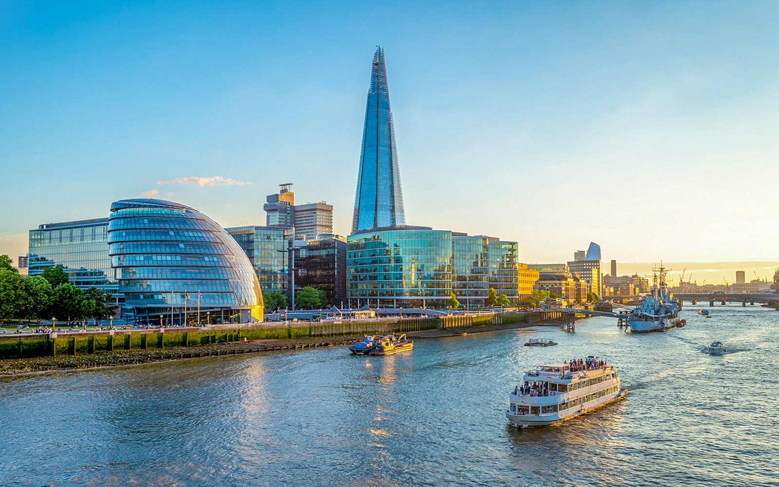 River Thames cruise with view of The Shard and City Hall in London.