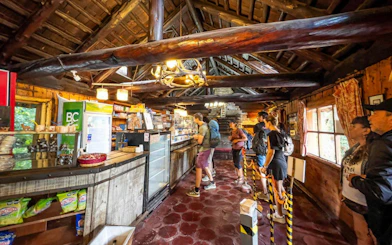 Historic interior of a rustic shop on Victoria Island, showcasing cultural heritage displays.