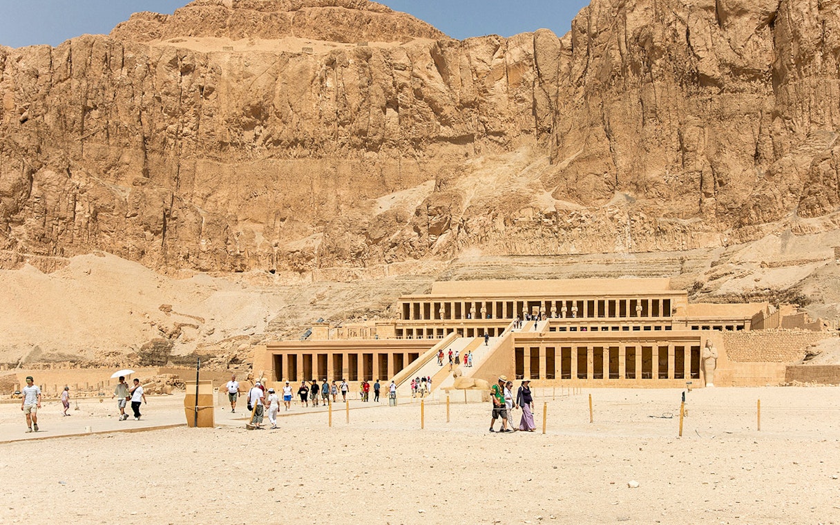 Ancient temple of Hatshepsut with tourists in Luxor, Egypt.