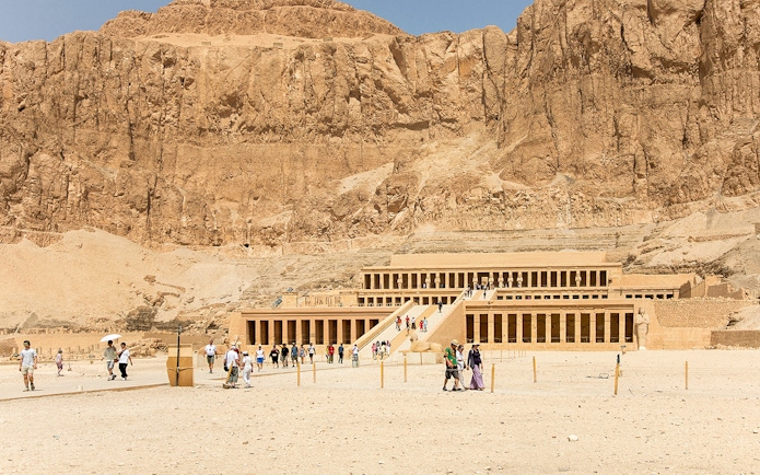 Ancient temple of Hatshepsut with tourists in Luxor, Egypt.