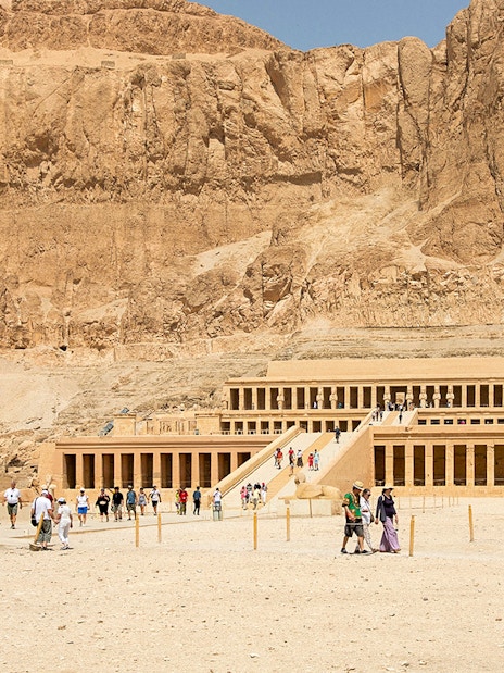 Ancient temple of Hatshepsut with tourists in Luxor, Egypt.