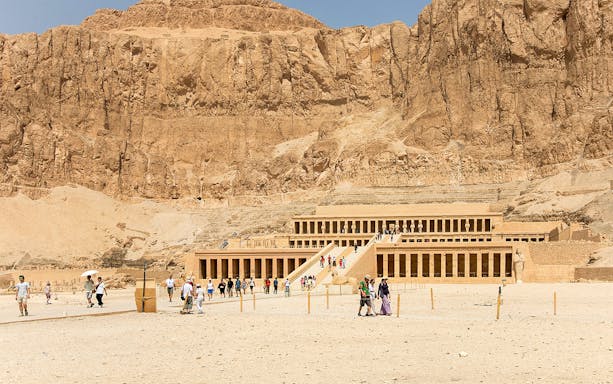 Ancient temple of Hatshepsut with tourists in Luxor, Egypt.