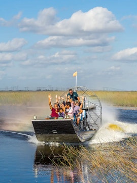 Airboat tour with passengers in the Florida Everglades.