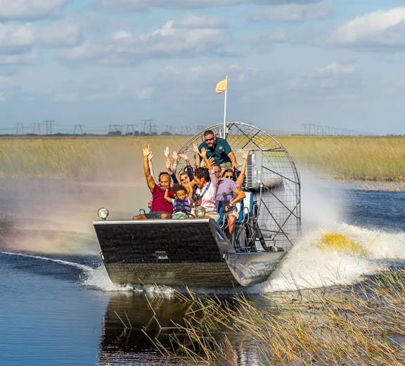 Airboat tour with passengers in the Florida Everglades.