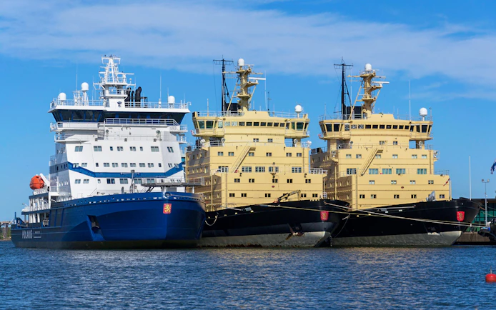 Icebreakers moored at Katajanokka island, Helsinki, Finland, on a sunny day.