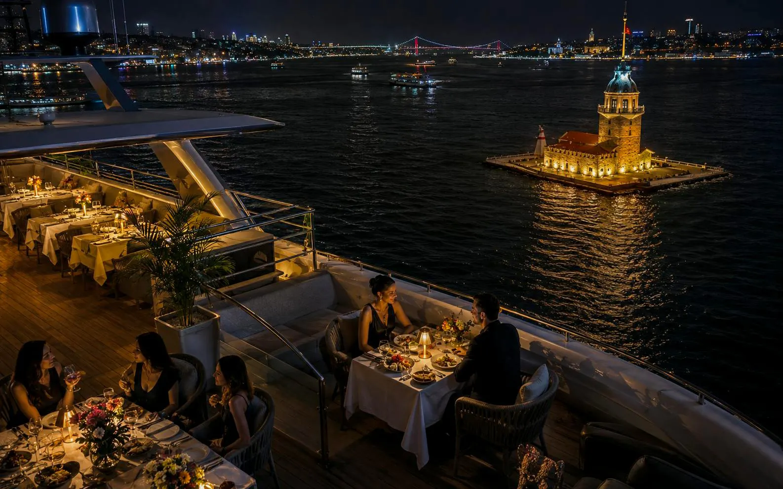 Dinner cruise on Bosphorus with view of Maiden's Tower, Istanbul.