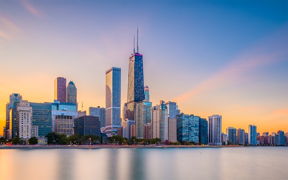 Chicago skyline at sunset viewed from Lake Michigan during a 90-minute scenic cruise.
