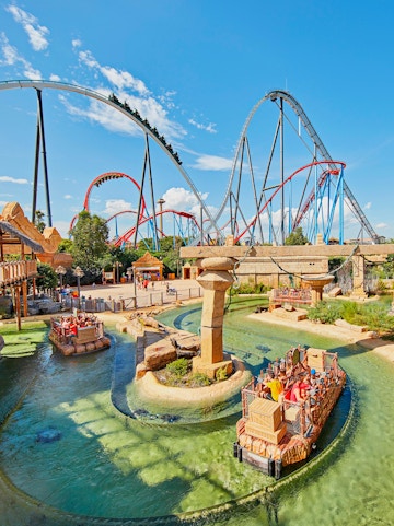 Roller coasters and water ride at Port Aventura World theme park.