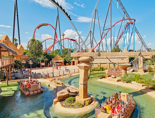 Roller coasters and water ride at Port Aventura World theme park.