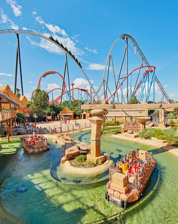 Roller coasters and water ride at Port Aventura World theme park.