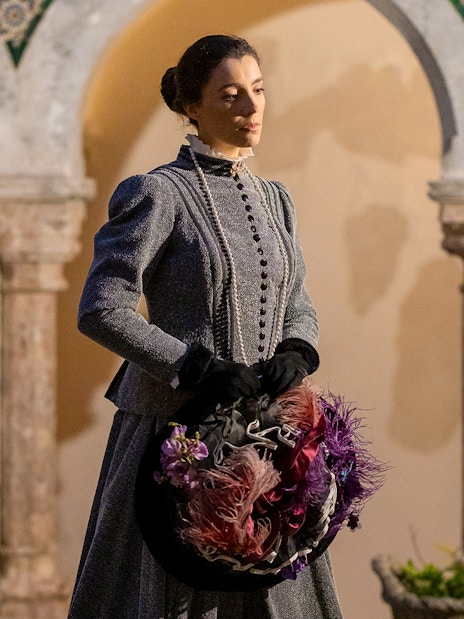 Woman in period costume at Palace of Pena during theatrical tour in Portugal.