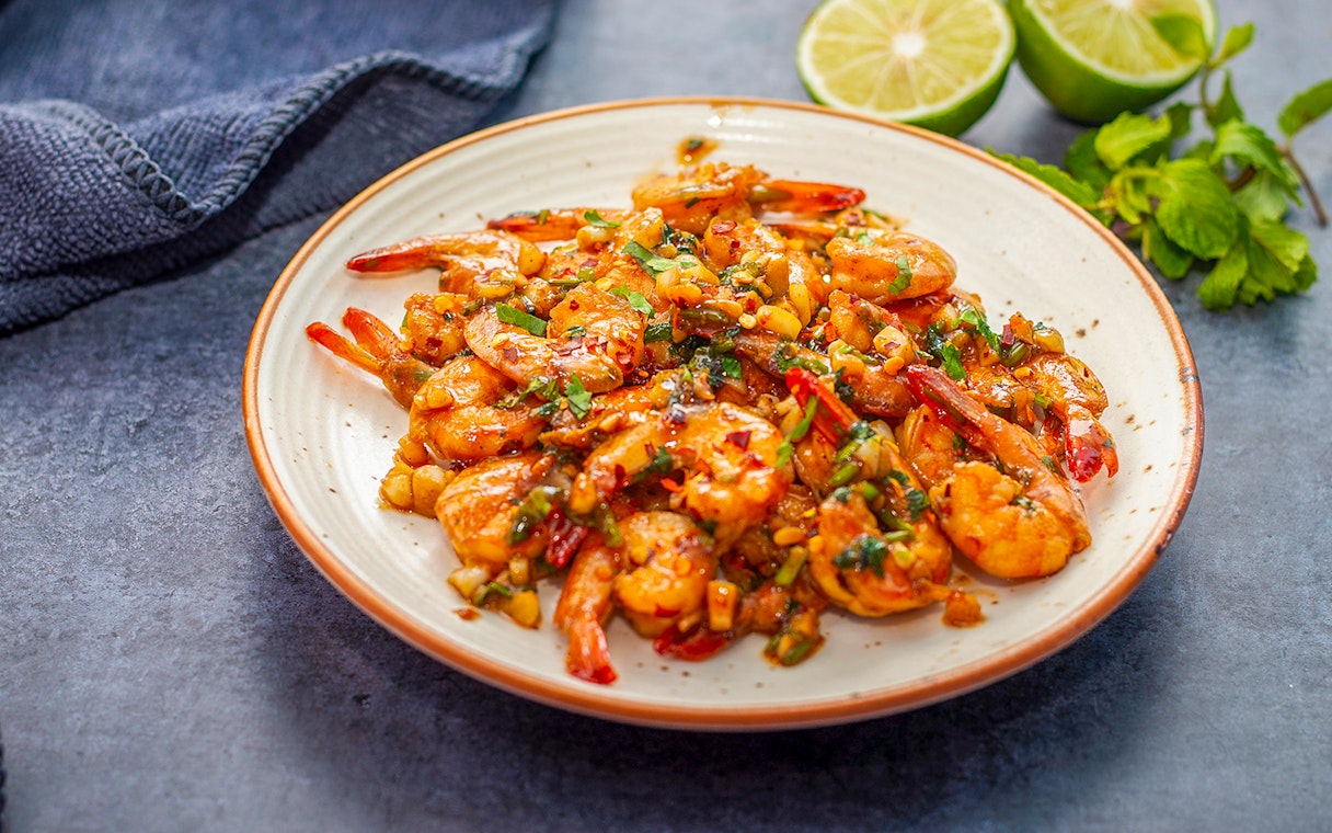 Grilled shrimp with herbs and spices, Jimbaran Bali seafood dinner.