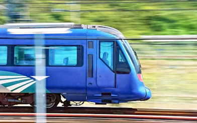 High-speed train traveling between Hong Kong International Airport and city center.