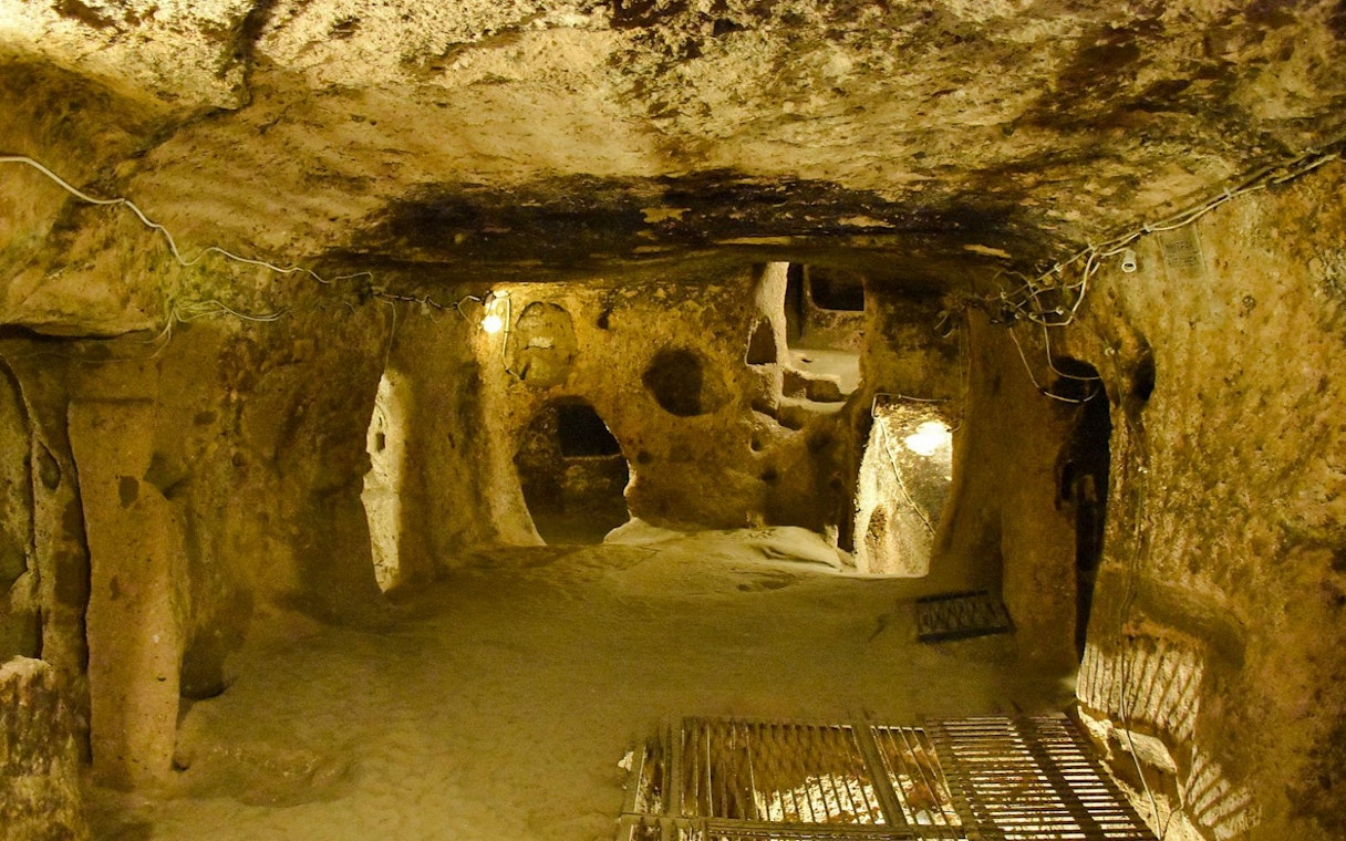 Kaymaki Underground City interior with stone walls and passageways in Goreme Valley, Cappadocia.